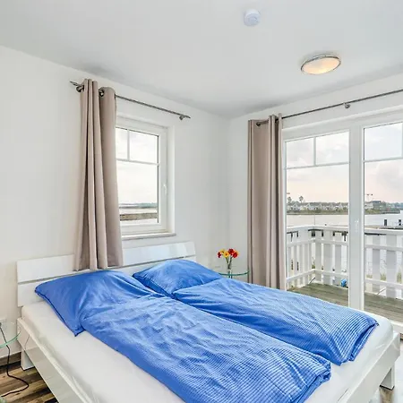 Weisse Strandvilla 56a בית נופש